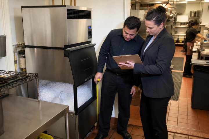 Commercial ice machine sizing consultation in a restaurant kitchen